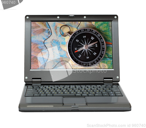 Image of small laptop with compass and map