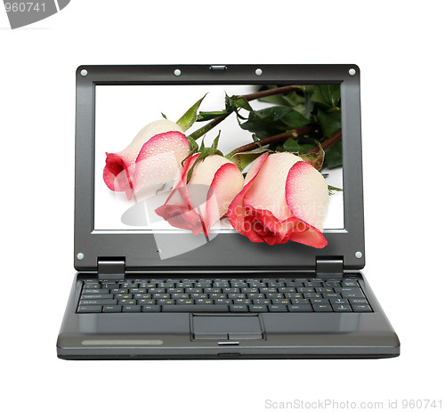 Image of laptop with roses bouquet
