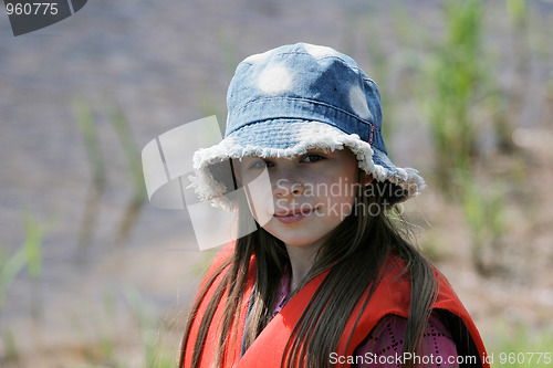 Image of Young girl in summer day.