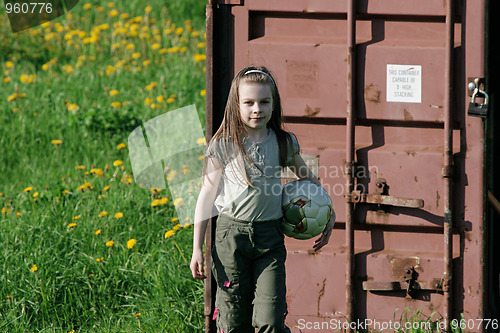 Image of Young girl in summer day.