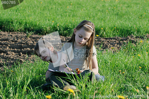 Image of Brother and sister in summer day.