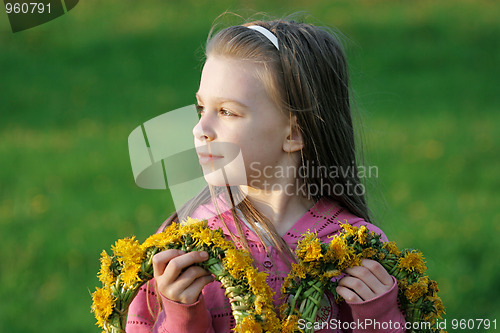 Image of Young girl in summer day.