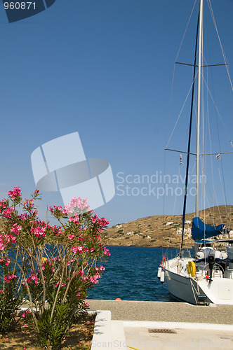 Image of yacht with flowers harbor Ios Greek islands