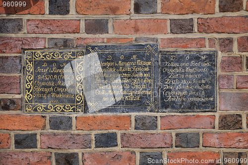 Image of The plaque in the wall of St Mary's Church in Cracow