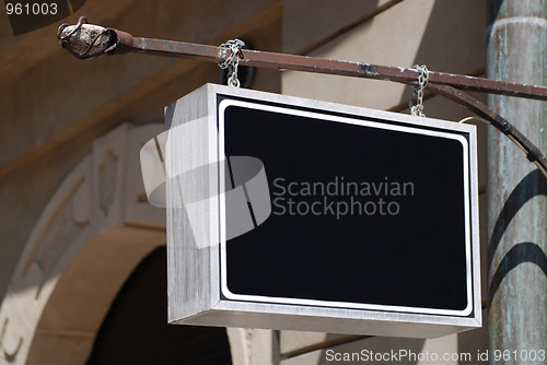 Image of sign henging on a wall 