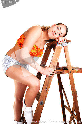 Image of Pretty girl on the stepladder.