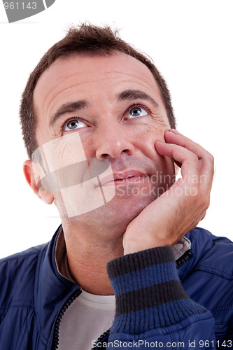 Image of Portrait of a handsome middle-age man, with a hand on the face
