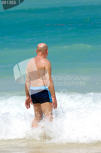 Image of Senior man in water