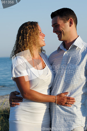 Image of Happy young couple at beach