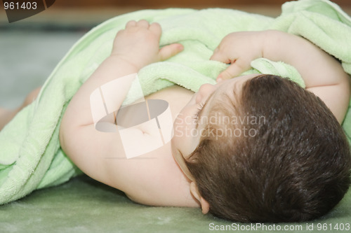 Image of Baby covered with towel