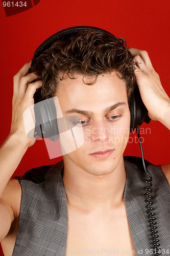 Image of Disc jockey with earphones