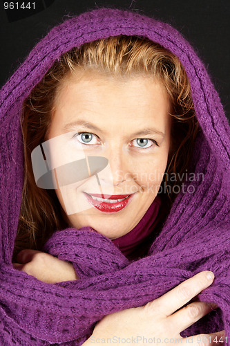 Image of Blond woman with purple woolen scarf