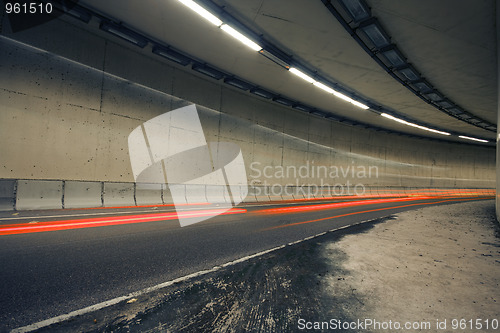 Image of Car lights trails in a tunnel 