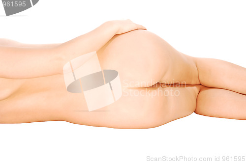 Image of Nude woman lying on floor.