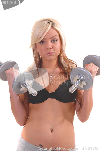 Image of Young woman exercising.