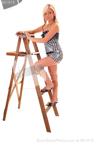 Image of Girl on stepladder.