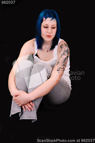 Image of Sad blue haired girl.