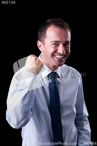 Image of Portrait of a very happy  businessman with his arm raised