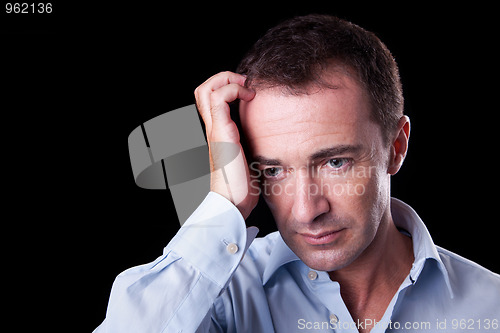 Image of Portrait of a handsome man thinking
