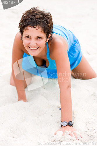 Image of brunet woman in blue dress