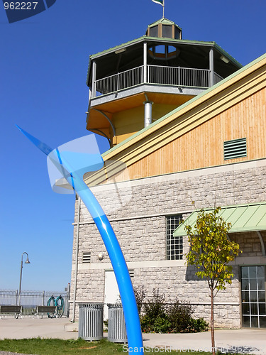 Image of Yellow tower with banquet hall. 