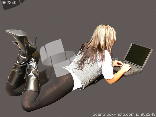 Image of Young lady lying in tights.