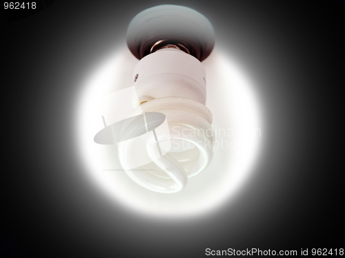 Image of Glowing bulb in black circle