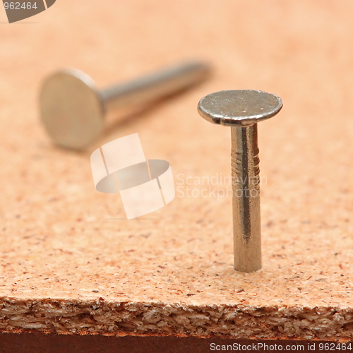 Image of Nail and board