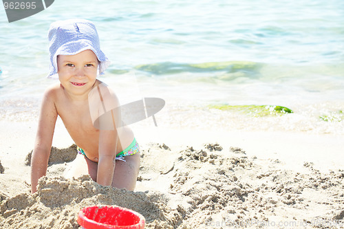 Image of Smiling girl on beach