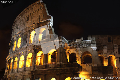 Image of Colosseum at night in Rome, Italy  