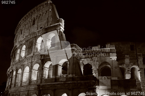 Image of Colosseum at night in Rome, Italy  