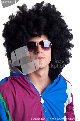 Image of man wearing wig and sunglasses