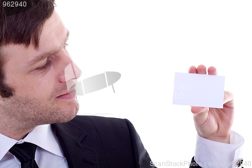 Image of  man holding a visiting card 