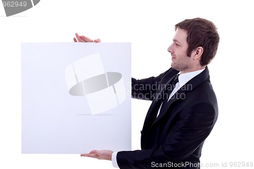 Image of man holding an empty sign