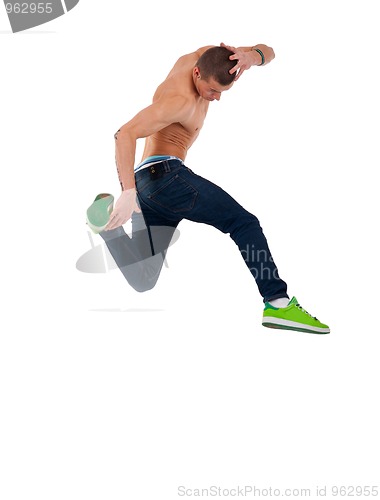 Image of shirtless dancer jumps