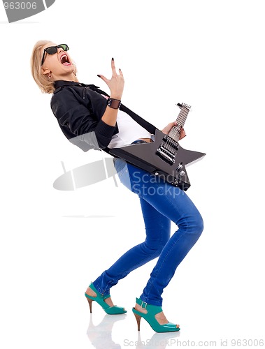 Image of energic blond girl with guitar