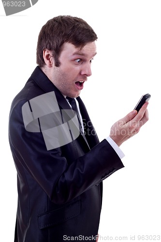 Image of man looking at phone astonish