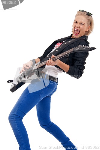 Image of passionate girl guitarist
