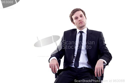 Image of man sits in office chair