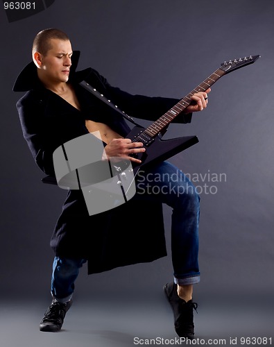 Image of man with guitar