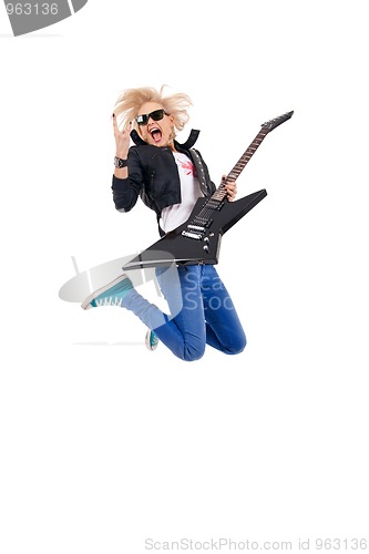 Image of woman guitarist jumps