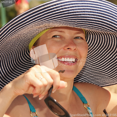 Image of Smiling woman in striped hat