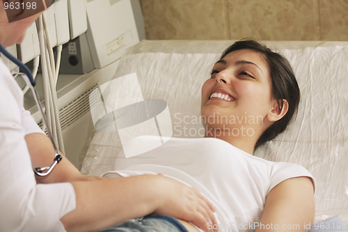 Image of Smiling patient on couch