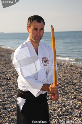 Image of Man exercising with sword