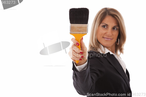 Image of businesswoman writing at the whiteboard