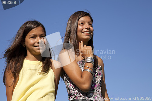 Image of Happy sisters outdoor