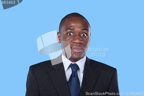 Image of Surprised african businessman