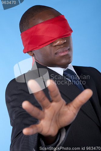 Image of blindfold african businessman