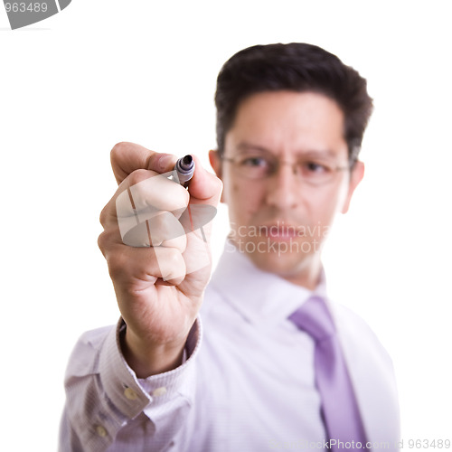 Image of businessman writing at a whiteboard