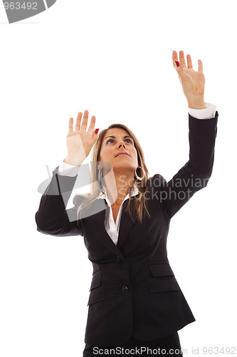 Image of Businesswoman reaching something